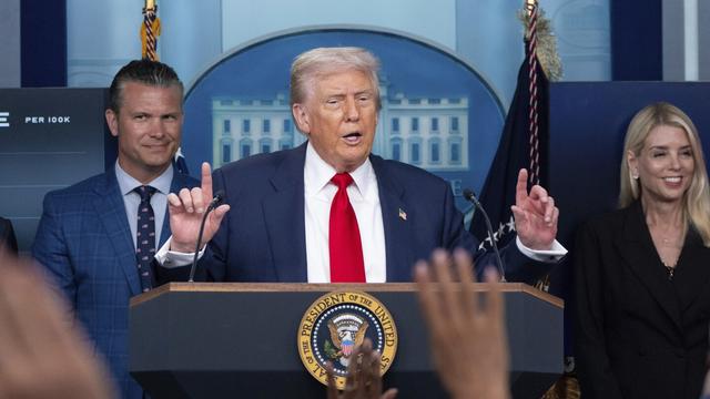 President Donald Trump speaks with reporters in the James Brady Press Briefing Room at the White House, Aug. 11, 2025, in Washington, as Secretary of Defense Pete Hegseth, left, and Attorney General Pam Bondi look on. (AP Photo/Alex Brandon, File)