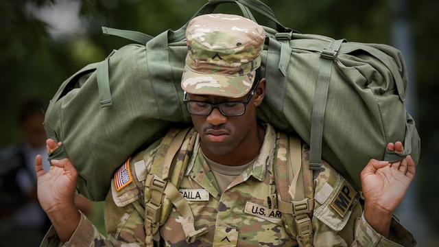 A member of the District of Columbia National Guard arrives at the District of Columbia National Guard Headquarters, Tuesday, Aug. 12, 2025, in Washington. (AP Photo/Julia Demaree Nikhinson)